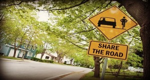share the road sign